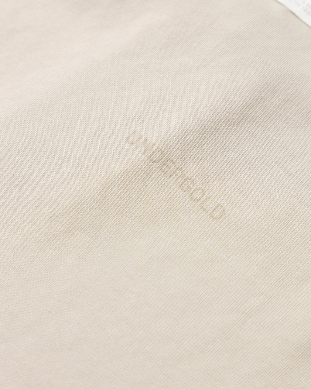UNDERGOLD GOLDEN HERITAGE RAW BABY TEE – CREAM
