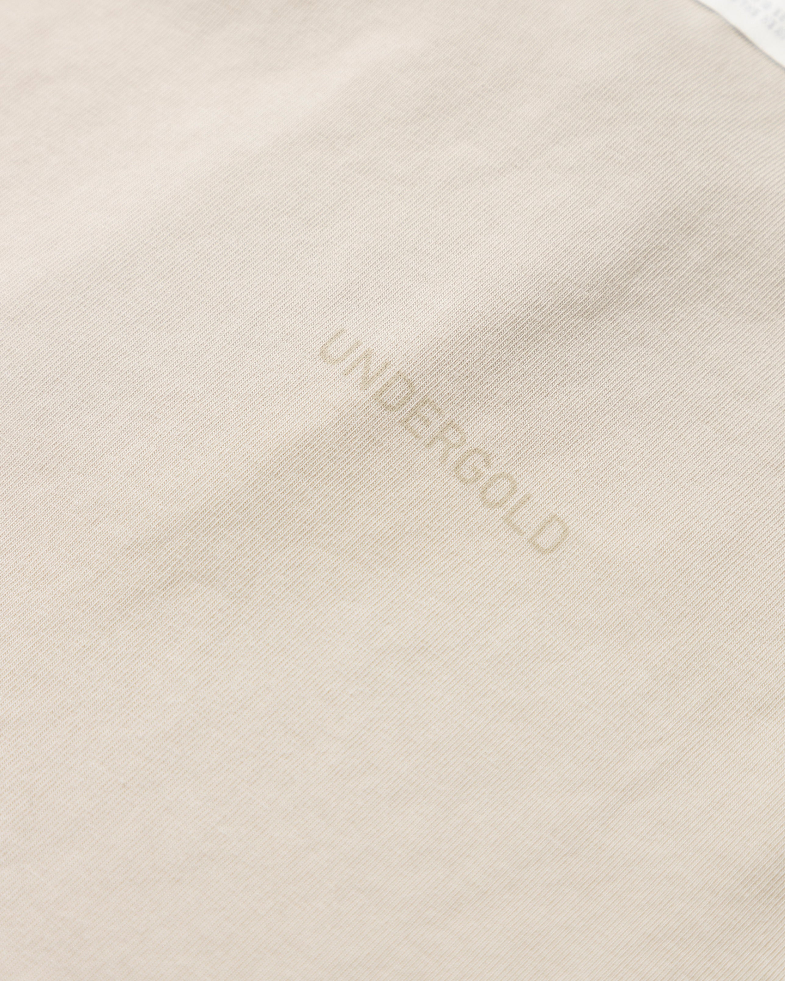 UNDERGOLD GOLDEN HERITAGE RAW BABY TEE – CREAM