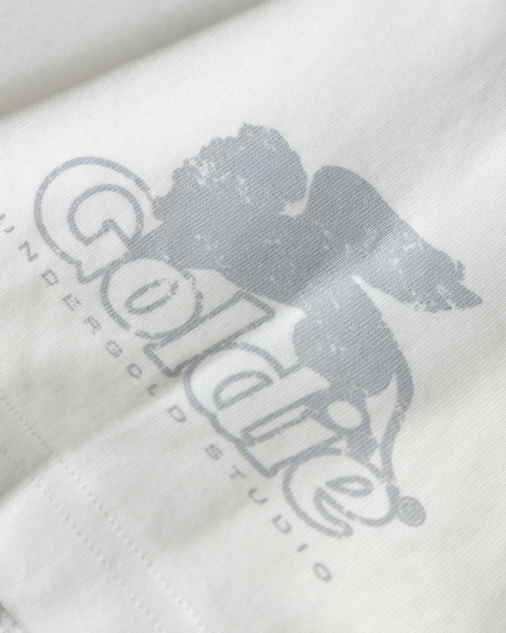 UNDERGOLD  AGNUS DEI AWAKENING BOXY FIT TSHIRT WHITE