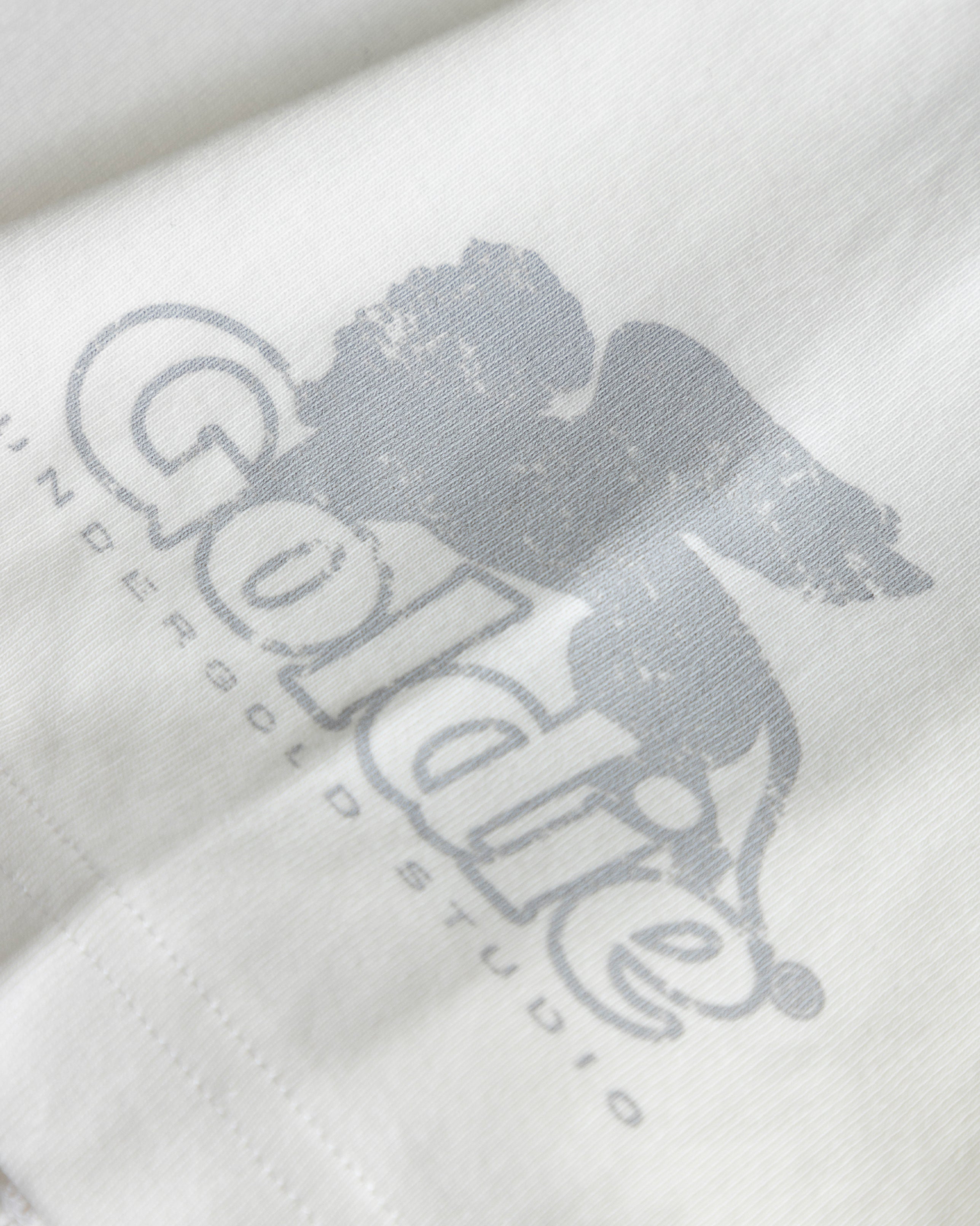 UNDERGOLD  AGNUS DEI AWAKENING BOXY FIT TSHIRT WHITE