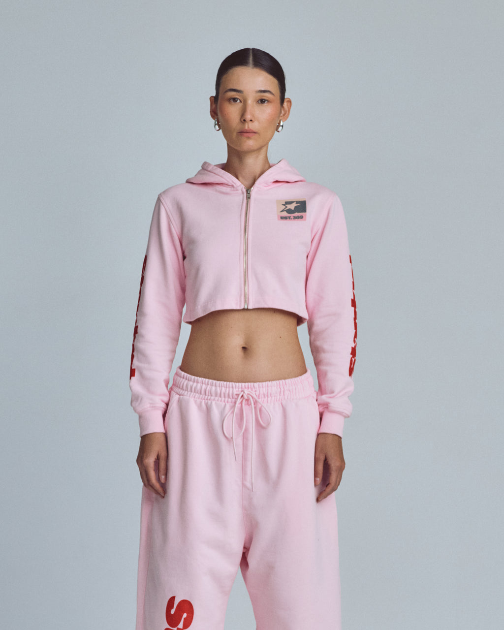 UNDERGOLD W STARDUST SYMBOL SLIM FIT ZIP UP CROPPED HOODIE PINK