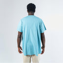 UNIQLO KAWS FIGURE T-SHIRT – TEAL BLUE