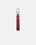 Llavero multiherramienta THE FRENCHIE CO Remove Before Flight 2.0 rojo, vista frontal en cuero italiano con mosquetón de titanio