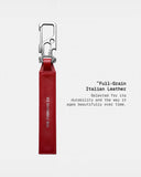 Llavero multiherramienta THE FRENCHIE CO Remove Before Flight 2.0 rojo, vista posterior con el sello de la marca